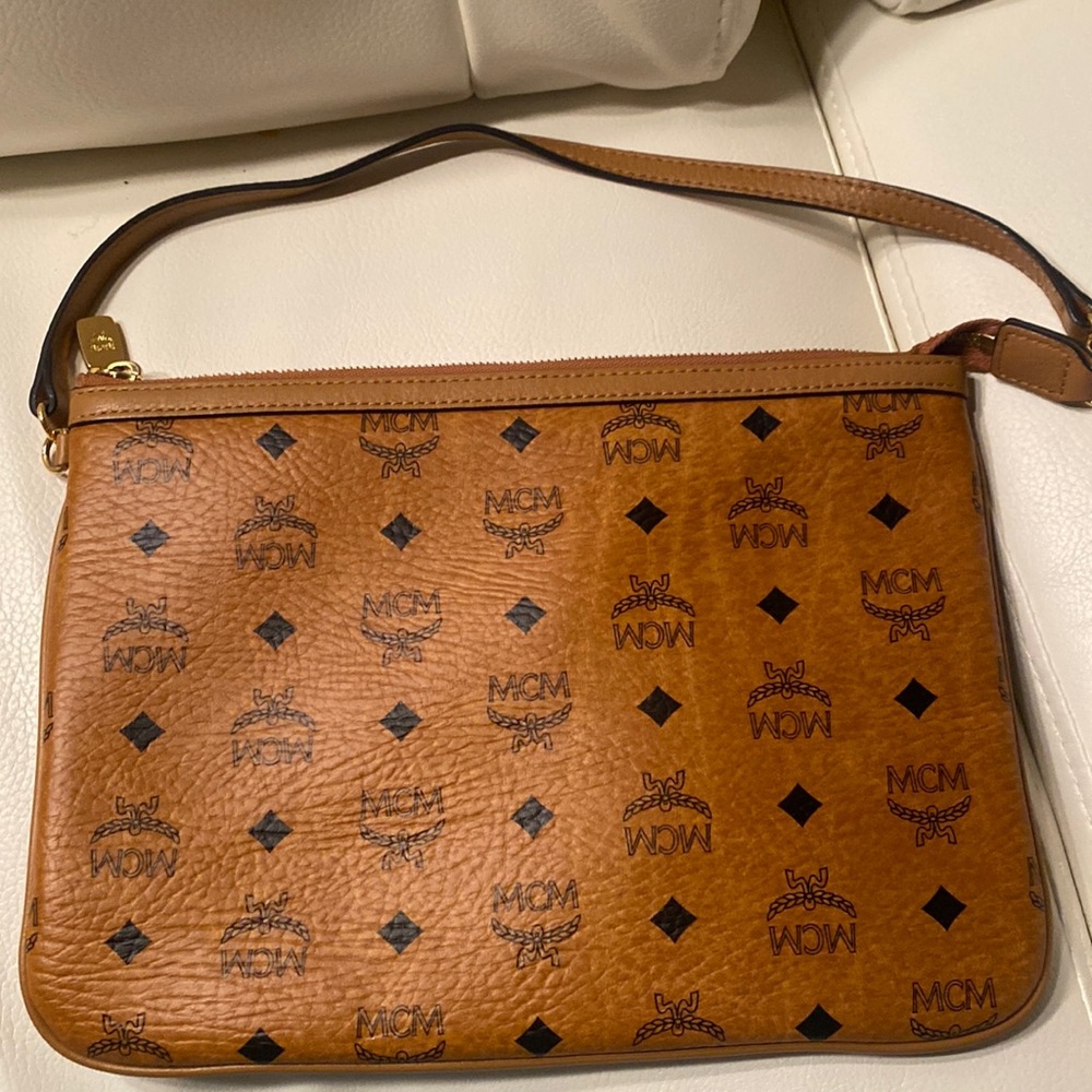 MCM Visetos Pouch. Worn once . Dust bag included